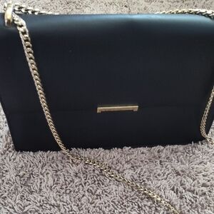Ivanka Trump Elegant Black Handbag with Gold Chain
